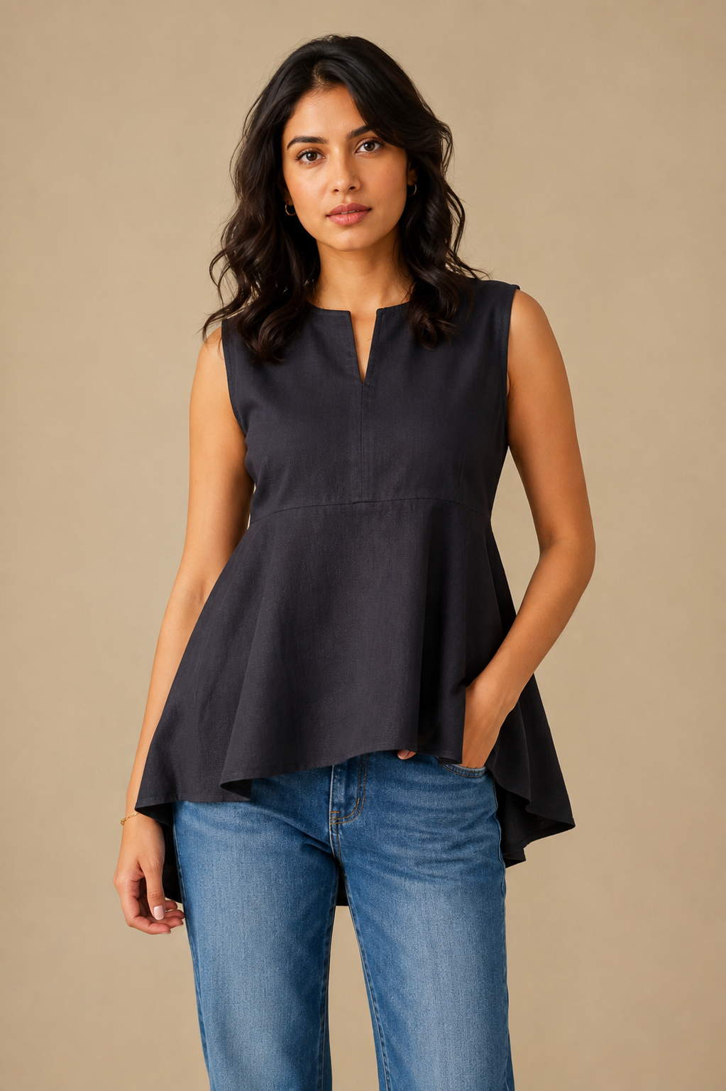 Women's black sleeveless peplum top with split neckline